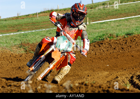 a guy rider on a motocross bile motorcycle jumping and racing big air Stock Photo