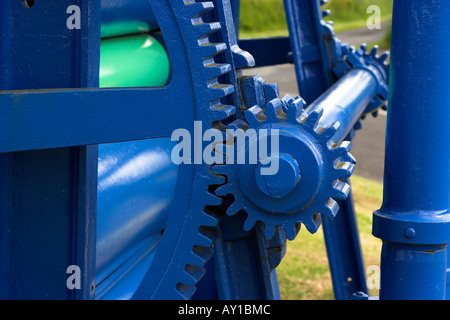 Blue cogs in machine Stock Photo