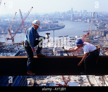 Construction Workers On Girders Above London Stock Photo