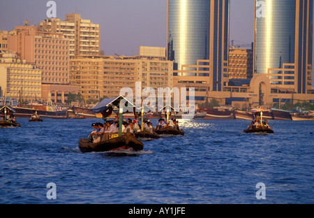 Abra ferries crossing Dubai Creek Deira Dubai United Arab Emirates Stock Photo