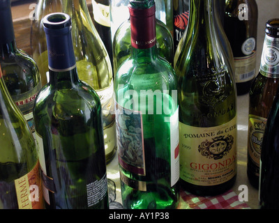 Empty wine bottles gathered up after a party Stock Photo