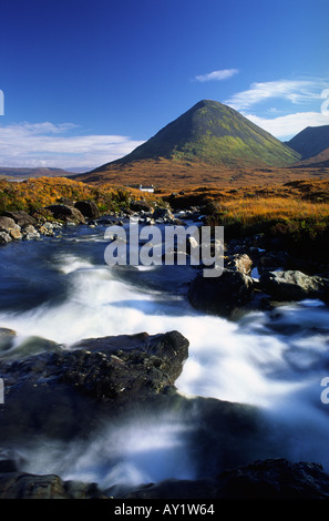 Allt Dearg Mor river leading to Alltdearg House with Sgurr Mhairi hill in the background on the Isle of Skye Scotland UK Stock Photo