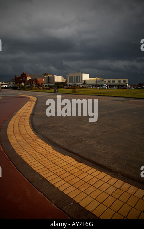 stormy sky over amusement arcade in the seaside resort of morecambe in lancashire in north west england Stock Photo