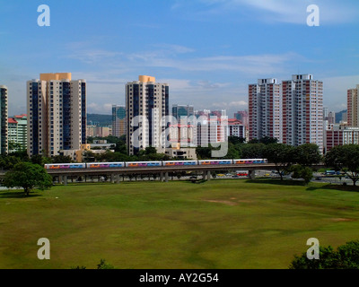 High rise apartment buildings and MRT subway line in Singapore Stock Photo