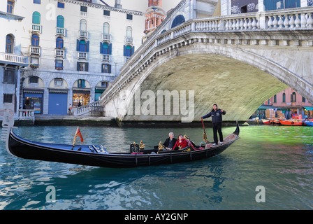 Venice Italy a view of the Gran Canal and the Rialto bridge with a gondola Stock Photo