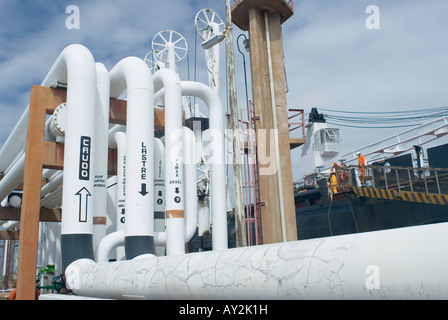 An system of ducts carries refined hydrocarbons to tankers and also receives incoming crude oil at Pemex Pajaritos complex Stock Photo