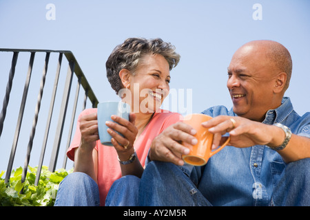 Senior African American couple drinking coffee Stock Photo