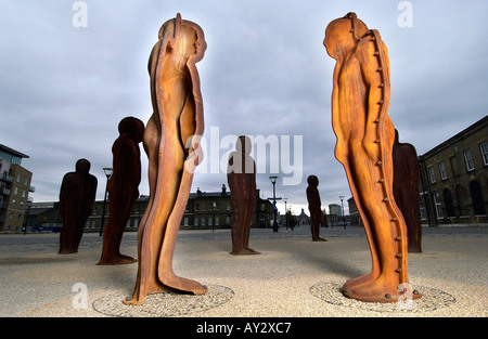 Sculptor Peter Burkes 16 piece installation of cast iron body moulds at Royal Arsenal Pier Woolwich Arsenal London Stock Photo