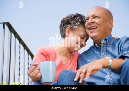 Senior African American couple hugging Stock Photo