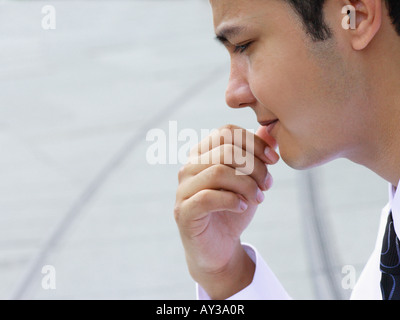 Close-up of a businessman thinking Stock Photo