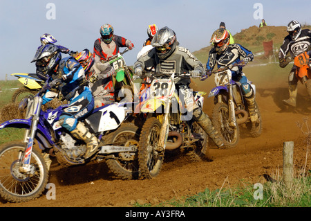 a guy rider on a motocross bile motorcycle jumping and racing big air Stock Photo