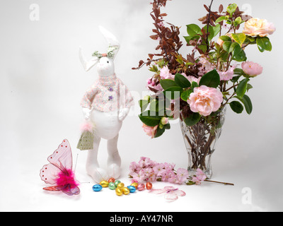 Easter Rabbit Easter Eggs Butterfly and Easter Flowers Stock Photo