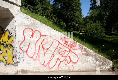 Colorful graffiti on entrance to underpass tunnel in rural Estonia East Europe Stock Photo