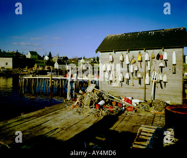 Picturesque lobster fishing village of Port Clyde on the Maine coast where fishing paraphanalia clutters the docks Stock Photo
