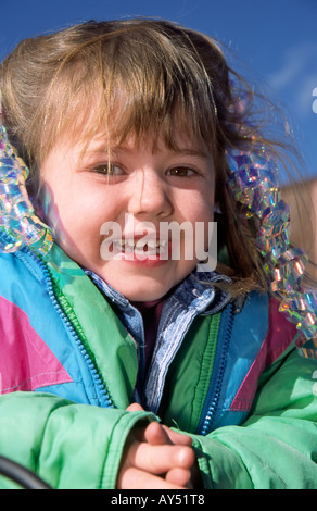 A tinsel-draped Christmas cutie is fashionably decorated, at the annual Cowboy Christmas celebration in Capitan, New Mexico. Stock Photo