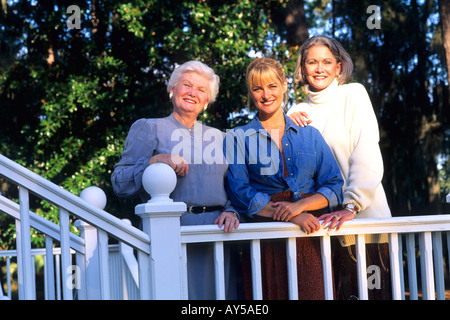 Three Gererations of Attractive Women on Porch Stock Photo