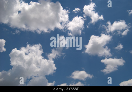 white cumulus clouds and blue sky Stock Photo
