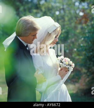 Bride and groom after wedding outdoors Stock Photo