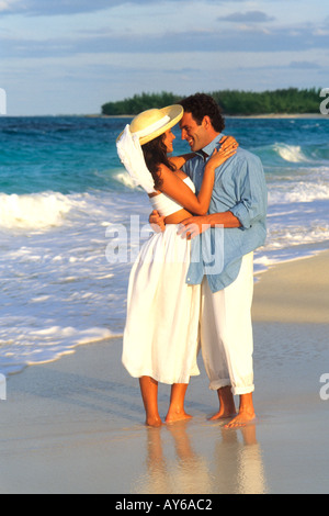 Romantic Couple in White on Luxurious Caribbean Beach Stock Photo