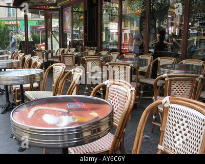 empty roadside terrace of Parisian cafe France Stock Photo