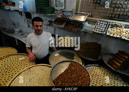 An Arab pastry shop in the souk of the old town of Aleppo, Syria Stock Photo