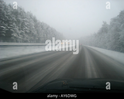 motorway in winter seen from driver's view Stock Photo