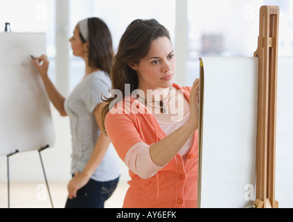 Female college students in art class Stock Photo