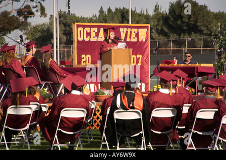 A high school senior of Middle Eastern origin speaks at graduation Stock Photo