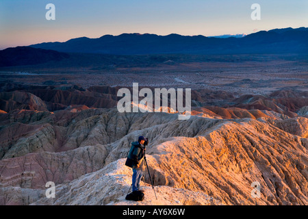 Photographer in the Badlands of Anza Borrego Desert State Park in southern California along Mexican border Stock Photo