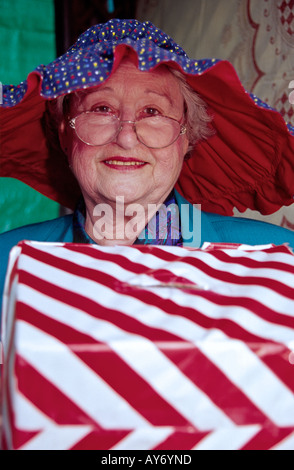 MR 561 Nelda Bailey presents a gift at the Mayfair celebration in Cloudcroft, New Mexico. Stock Photo