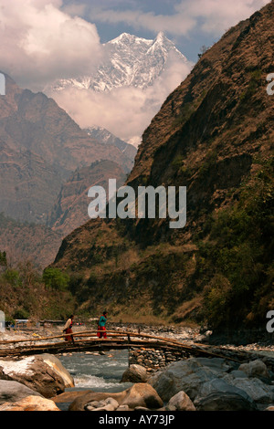 small bridge over the Kali Gandaki river near Tatopani Nepal Stock Photo