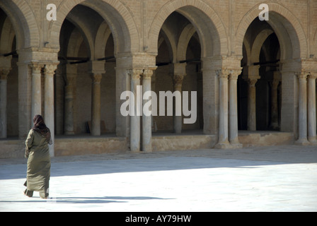 Local woman in Great Mosque or Sidi Oqba Mosque Kairouan Tunisia Stock Photo