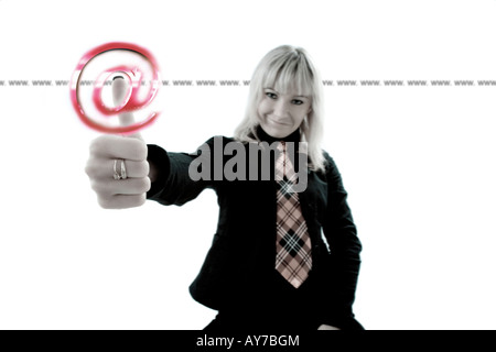 Woman in black suit pressing a virtual internet symbol Stock Photo
