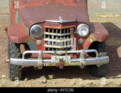 Portrait of an early 1950s Willys Jeep in a field near the town of Metolius in central Oregon Stock Photo