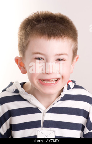 Studio Portrait Of Seven Year Old Boy Stock Photo