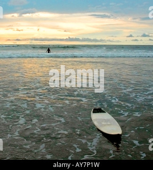 Playa Tamarindo Surf and Sunset Stock Photo