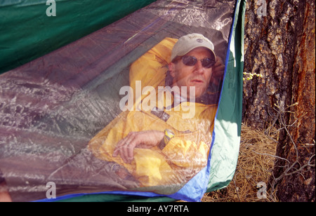 Relaxing in a hammock in the Lincoln National Forest, near Ruidoso, New Mexico. Stock Photo