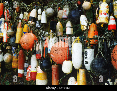 Variety of colorful buoys hanging at Trinadad Bay in Northern California Stock Photo