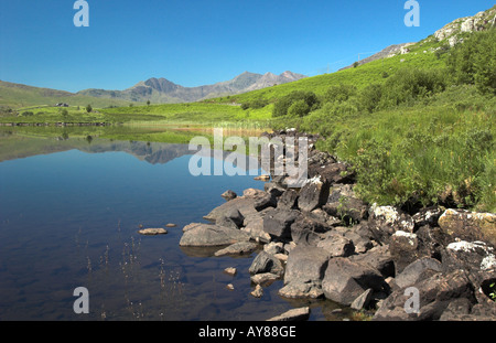 Llyn Mymbyr with the Snowdon horseshoe in the distance. North Wales. Stock Photo