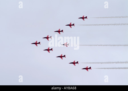 The Red Arrows Hawk Aircraft in formation with a with a Gnat Stock Photo