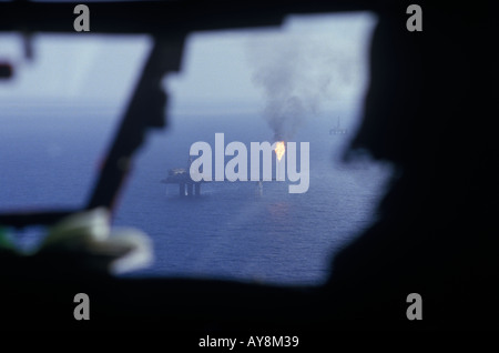 1980s North Sea Scottish oil rig aerial view from a supply helicopter. Scotland. Burn off. 1981 HOMER SYKES Stock Photo