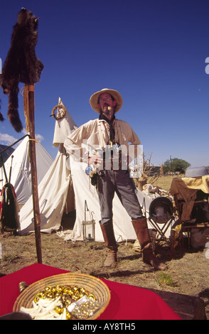 MR 571 Mountain man Paul Wenzel stands guard over the camp, at 'Miner's Day' in the ghost town of White Oaks, New Mexico. Stock Photo