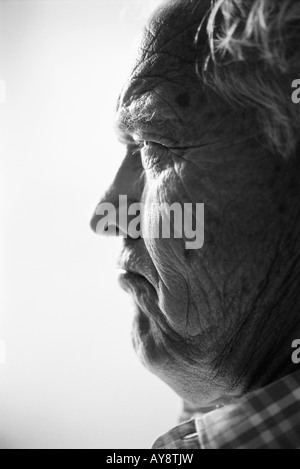 Man frowning, profile, portrait Stock Photo