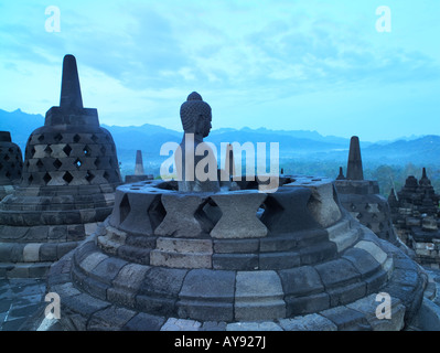 Buddha, in pre-dawn light, Borobudur, Java, Indonesia Stock Photo