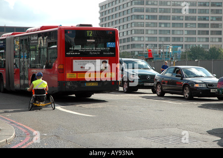 Man on wheelchair on Westminster Bridge in London, UK Stock Photo