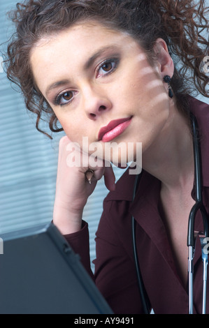 Young woman working in medical office Stock Photo