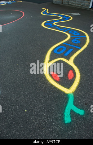 Stock photo of a painted snake in a childrens schoolyard Stock Photo