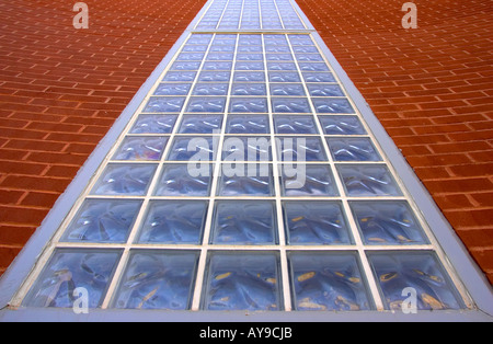 Glass bricks on the side of a building. Stock Photo
