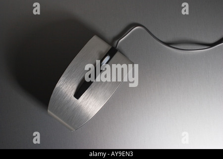 silver computer mouse on modern desk Stock Photo