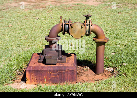 Bore water pipe stained brown with bore water and rust. Lake Monger Reserve, Perth, Western Australia Stock Photo